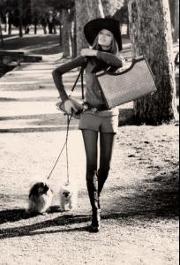 Veruschka_in_the_Borghese_Gardens_of_Rome__suede_vest__shorts__shirt__leather_belts_by_Gucci__straw_hat_by_Remo_Argenti__boots_by_Valentino__bags_by_Gucci__1971_byHenryClarke.jpg