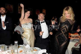 145247777-milla-jovovich-and-natasha-poly-attend.jpg