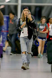 Cara-Delevingne-at-JFK-Airport--18.jpg