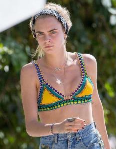 Cara Delevingne in Bikini Top on the beach in Barbados 1.jpg