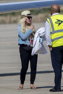 christina-aguilera-at-the-airport-in-cyprus-9717-10.jpg