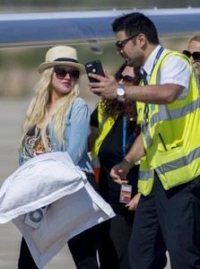 christina-aguilera-at-the-airport-in-cyprus-9717-15.jpg