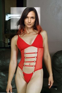 Famke Janssen - red swimsuit.jpg