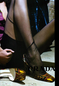 Meisel_Prada_Fall_Winter_03_04_01.thumb.png.7636a14d8074ae1af28e728c4605bff7.png