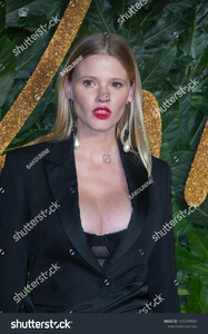 stock-photo-lara-stone-arrives-at-the-fashion-awards-at-the-royal-albert-hall-on-december-in-1256340043.jpg