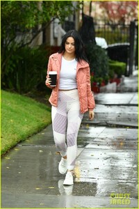 camila-mendes-braves-the-rain-for-coffee-run-04.jpg