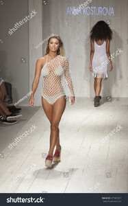 stock-photo-a-model-walks-the-runway-for-anna-kosturova-fashion-show-during-funkshion-swim-summer-on-july-477437227.jpg