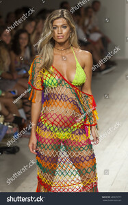 stock-photo-a-model-walks-the-runway-for-anna-kosturova-fashion-show-during-funkshion-swim-summer-on-july-489625777.jpg