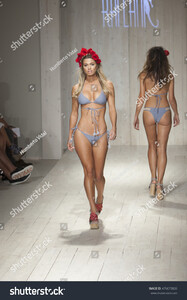 stock-photo-a-model-walks-the-runway-for-kai-lani-fashion-show-during-funkshion-swim-summer-on-july-476673826.jpg