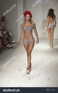 stock-photo-a-model-walks-the-runway-for-kai-lani-fashion-show-during-funkshion-swim-summer-on-july-476673847.jpg