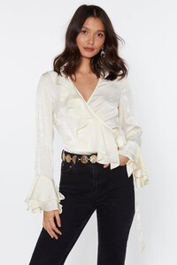 cream-i-like-it-ruffle-wrap-top (1).jpeg