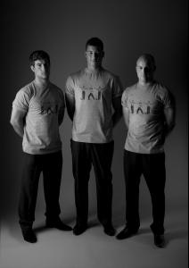 Three rugby players in orchid t-shirt2.jpg