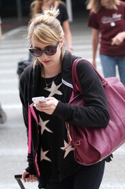 Emma_Roberts_Touches_Down_LAX_n_Ni_PTi_TUS8-l.jpg