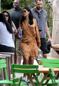 Rihanna-in-Mini-Dress-at-a-poolside-bar--04.jpg