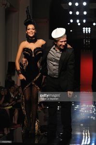 nabilla-benattia-and-fashion-designer-jean-paul-gaultier-walk-the-picture-id172547769.jpg
