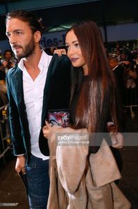 nabilla-benattia-and-thomas-vergara-arriving-at-the-jean-paul-show-picture-id182260896.jpg