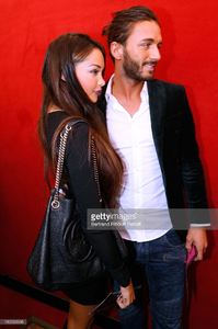 nabilla-benattia-and-thomas-vergara-arriving-at-the-jean-paul-show-picture-id182260908.jpg