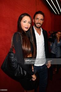 nabilla-benattia-and-thomas-vergara-attend-the-jean-paul-gaultier-as-picture-id182121103.jpg