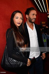 nabilla-benattia-and-thomas-vergara-attend-the-jean-paul-gaultier-as-picture-id182123348.jpg