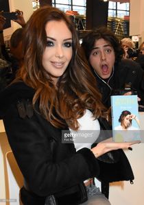 nabilla-benattia-poses-with-her-book-from-jai-lu-editions-during-trop-picture-id657838132.jpg