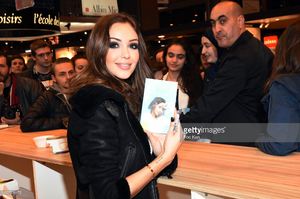 nabilla-benattia-poses-with-her-book-from-jai-lu-editions-during-trop-picture-id657838172.jpg