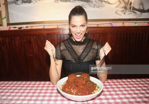 miss-universe-2017-iris-mittenaere-visit-buca-di-beppo-times-square-picture-id698475012.jpg