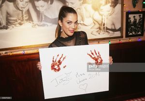 miss-universe-2017-iris-mittenaere-visit-buca-di-beppo-times-square-picture-id698475284.jpg