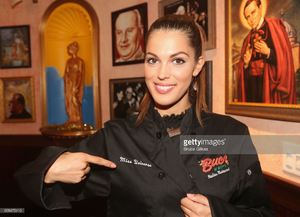 miss-universe-2017-iris-mittenaere-visit-buca-di-beppo-times-square-picture-id698475410.jpg