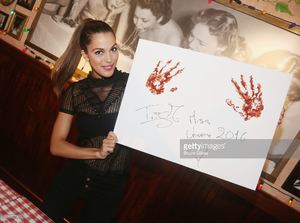 miss-universe-2017-iris-mittenaere-visit-buca-di-beppo-times-square-picture-id698477960.jpg