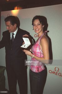 president-of-omega-stephen-urquart-with-mareva-gallanter-picture-id612610806.jpg