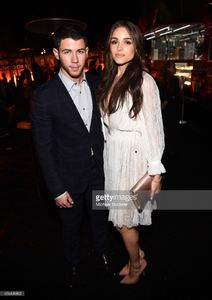 actor-nick-jonas-and-olivia-culpo-attend-the-premiere-event-for-on-picture-id456496862.jpg