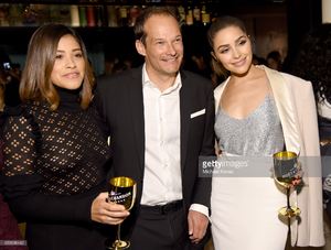 actress-gina-rodriguez-moet-and-chandon-vp-renaud-butel-and-actress-picture-id630996442.jpg