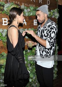 actress-olivia-culpo-and-designer-baja-east-scott-studenberg-attend-picture-id501699110.jpg