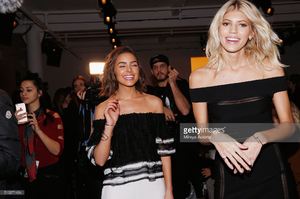 actress-olivia-culpo-and-model-devon-windsor-attend-the-jonathan-picture-id510271494.jpg