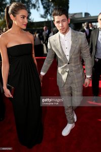 actress-olivia-culpo-and-recording-artist-nick-jonas-attend-the-57th-picture-id463010192.jpg