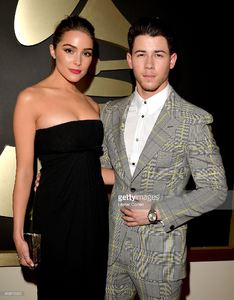 actress-olivia-culpo-and-recording-artist-nick-jonas-attend-the-57th-picture-id463010922.jpg