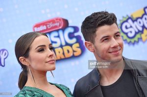 actress-olivia-culpo-and-singer-nick-jonas-arrive-at-the-2015-radio-picture-id472763032.jpg