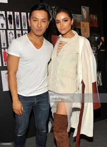designer-prabal-gurung-and-actress-olivia-culpo-poses-backstage-at-picture-id510283350.jpg