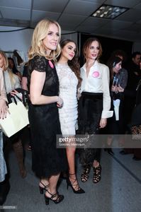 designers-karen-craig-and-georgina-chapman-pose-with-olivia-culpo-picture-id635557328.jpg