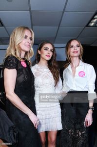 designers-karen-craig-and-georgina-chapman-pose-with-olivia-culpo-picture-id635559990.jpg