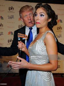 donald-trump-and-miss-universe-2012-olivia-culpo-arrive-at-the-2013-picture-id170733187.jpg