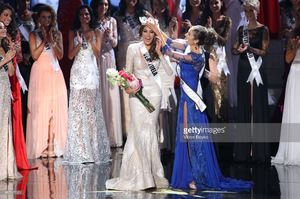 gabriela-isler-and-olivia-culpo-on-the-stage-during-the-miss-universe-picture-id187517031.jpg