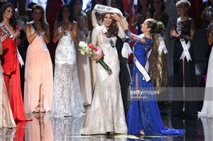 gabriela-isler-and-olivia-culpo-on-the-stage-during-the-miss-universe-picture-id187517042.jpg