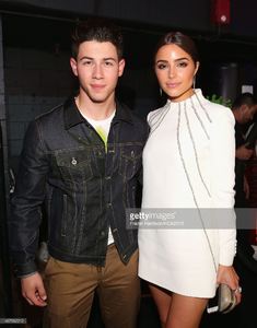 host-nick-jonas-and-actress-olivia-culpo-pose-backstage-during-28th-picture-id467962212.jpg