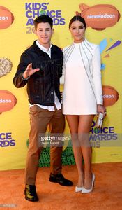 host-nick-jonas-and-model-olivia-culpo-attend-nickelodeons-28th-kids-picture-id467936386.jpg