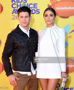 host-nick-jonas-and-model-olivia-culpo-attend-nickelodeons-28th-kids-picture-id467936472.jpg