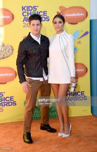 host-nick-jonas-and-model-olivia-culpo-attend-nickelodeons-28th-kids-picture-id467936980.jpg