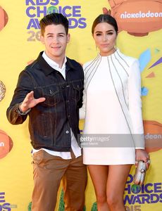 host-nick-jonas-and-model-olivia-culpo-attend-nickelodeons-28th-kids-picture-id467936992.jpg