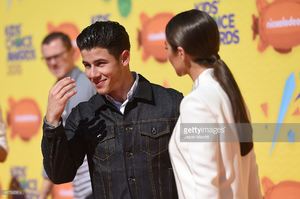 host-nick-jonas-and-model-olivia-culpo-attend-nickelodeons-28th-kids-picture-id467965814.jpg