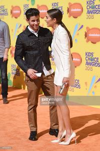 host-nick-jonas-and-model-olivia-culpo-attend-nickelodeons-28th-kids-picture-id467965816.jpg